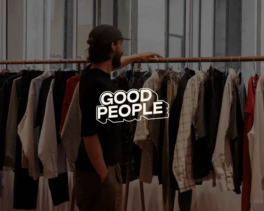 Man at a clothing rail with the Good People logo overlaid